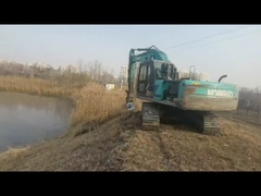 máy cắt cỏ máy xúc